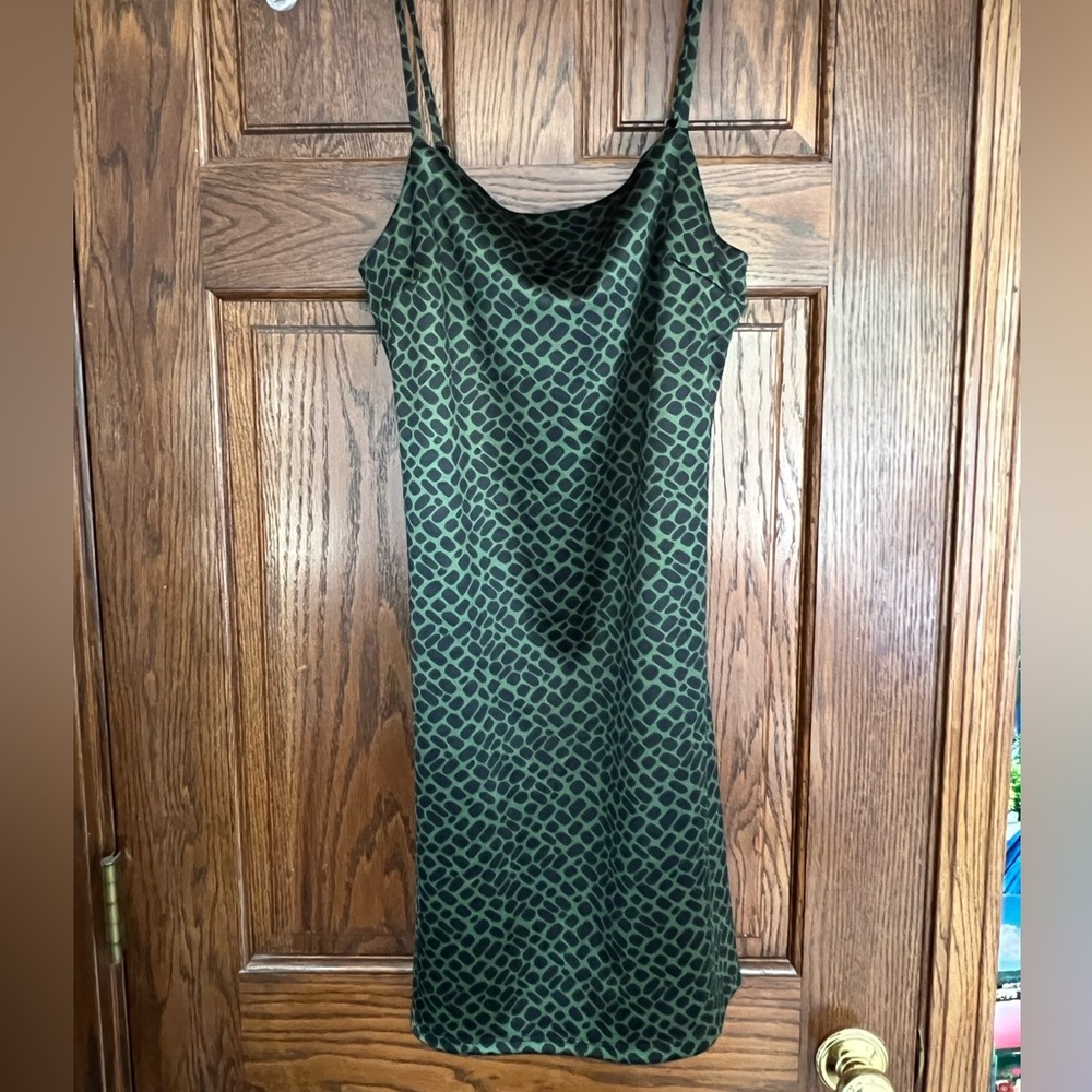 Green and black patterned dress
